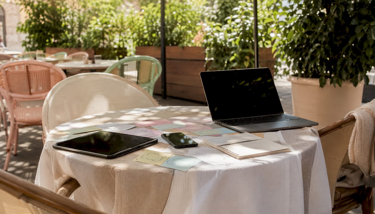 Digital devices and content notes on pastel table
